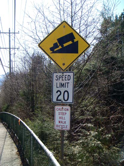 Caution steep hill walk bicycle.