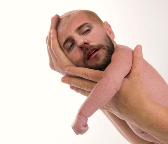Content Manbaby being held