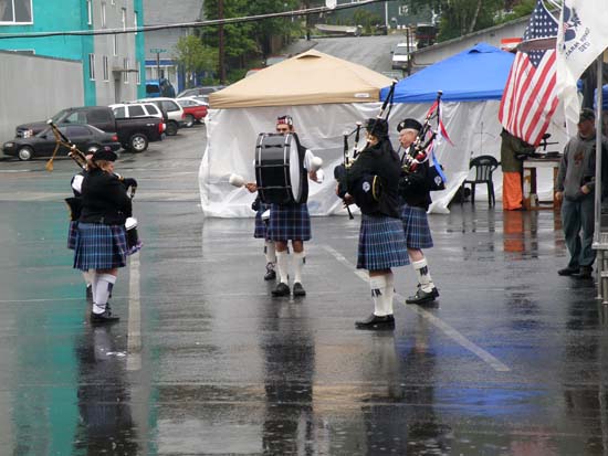 Misty Thistle Pipes & Drums playing in the rain